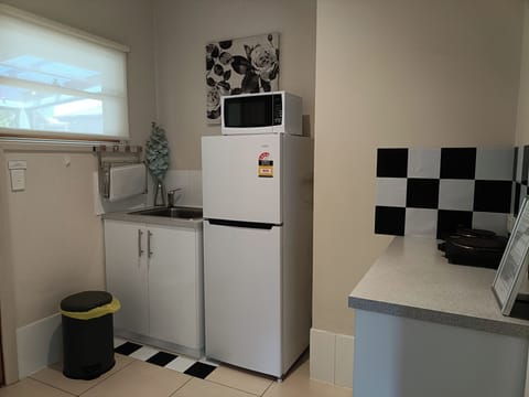 Fridge, microwave, coffee/tea maker, electric kettle