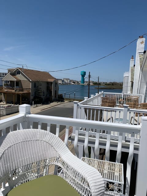 Relax on the balcony overlooking the bay. Watch the boats go by. 