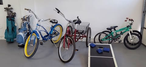 Enjoy our bikes, cornhole, golf clubs and more!