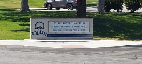 Wildflower Playfield entrance sign