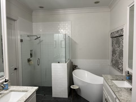 Combined shower/tub, hair dryer, towels, soap