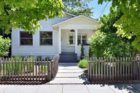Charming front porch welcomes you to cozy comfort