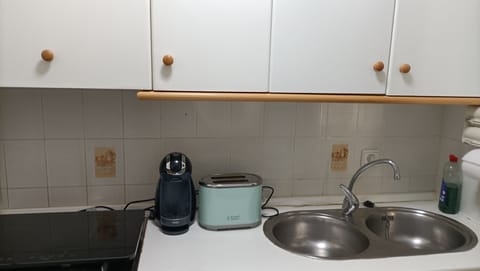 Microwave, coffee/tea maker, toaster, cookware/dishes/utensils