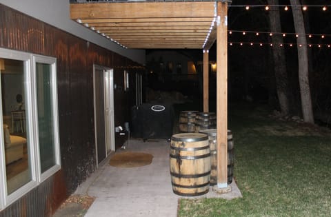 Back porch provides a grill and beautiful spot to enjoy an evening by the water.