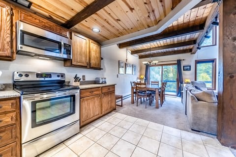 Kitchen - Kitchen- Offers a variety of kitchen utensils, a crock pot, coffee maker, and toaster.