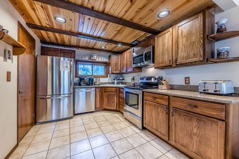 Kitchen - Ample counter space, and a variety of cooking utensils for creating the perfect vacation meal.