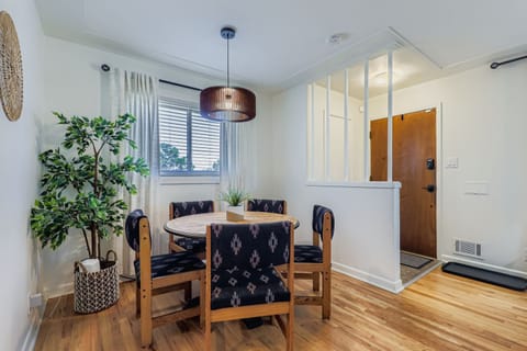 Updated cozy dining area with a round kitchen table perfect for shared meals.