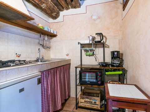 Cabinetry, Wood, Countertop, Building, Kitchen Stove, Kitchen, Table, Kitchen Appliance, Tap, Hardwood