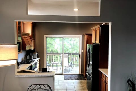 Another view of the kitchen and deck