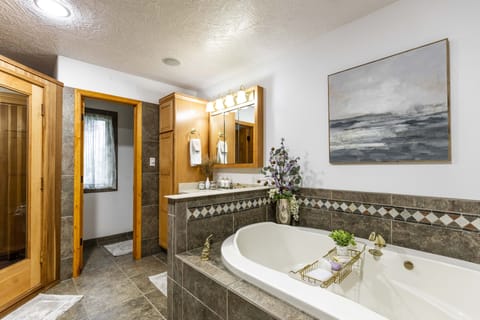Bathroom | Shower, jetted tub, hair dryer, towels
