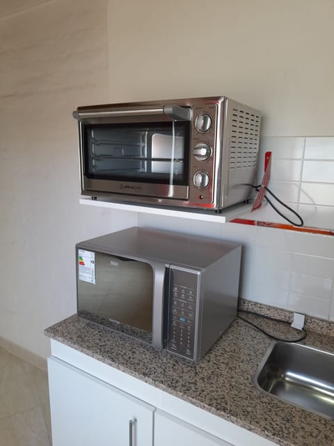 Microwave, oven, electric kettle, toaster