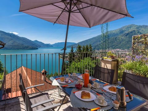 Sky, Mountain, Daytime, Building, Plant, Natural Landscape, House, Vegetation, Highland, Tree