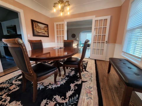 Dining seats 6, 4 at Kitchenette and included is 1 high chair with all utensils.