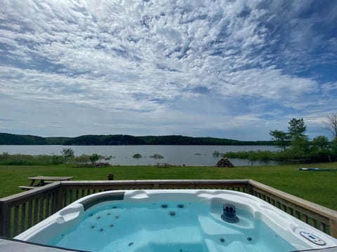 Soak your cares away under the blue skies of Beaver Lake.