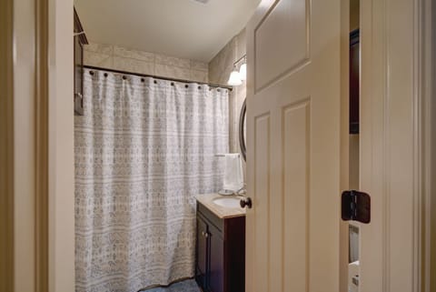 Combined shower/tub, hair dryer, towels, soap