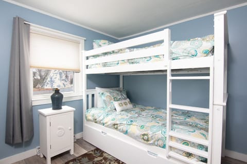 Twin bunk beds with trundle bed that pulls out underneath for a 3rd twin size