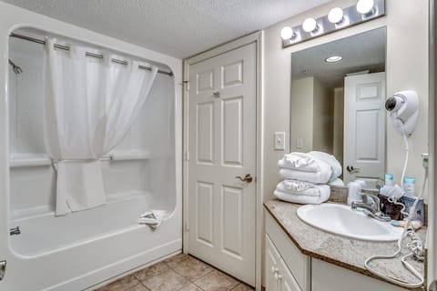 Combined shower/tub, hair dryer, towels, soap