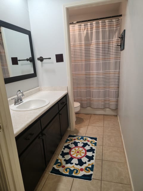 Combined shower/tub, hair dryer, towels, soap