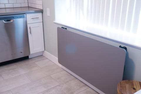 Collapsible kitchen dining table. Easily fold it away when it is not needed