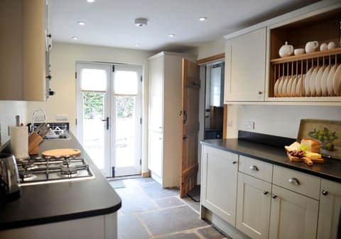 No.4 The Forge kitchen with patio doors to rear garden
