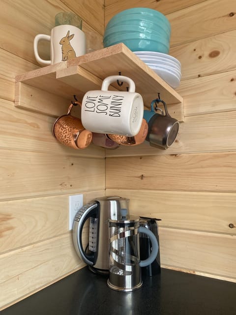 Fridge, stovetop, coffee/tea maker, electric kettle