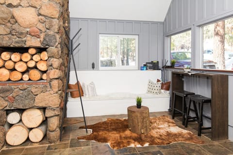 Rustic mudroom with coffee shop workspace.