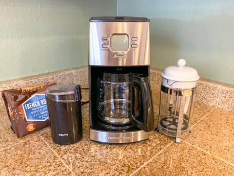 Drip coffee maker comes with filters, creamer and sugar. Also a French Press