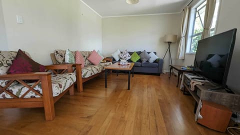 Living room - equipped with HD TV awesome sound, and guest Netflix to unwind