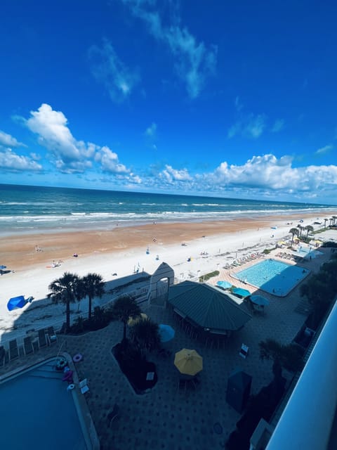 On the beach, sun loungers, beach towels