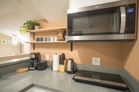 Microwave, cooktop, coffee maker, kettle, toaster
