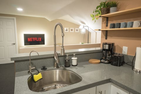 Open Kitchenette with direct TV view. Perfect for cooking & watching TV.