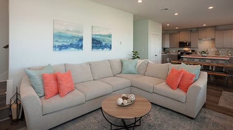 Cozy up on the sectional for a movie night or just relaxing after a day in the sand.