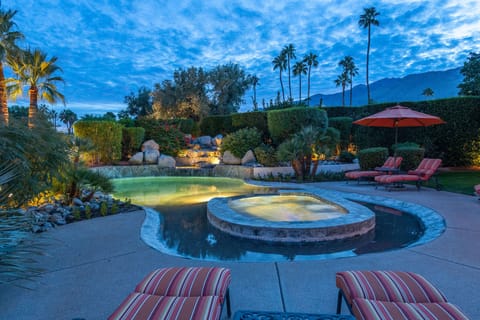 Outdoor pool, a heated pool, sun loungers