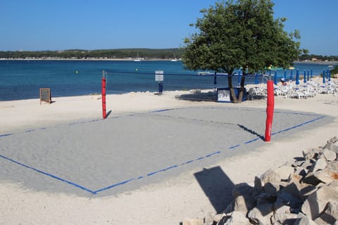 Beach nearby, sun loungers