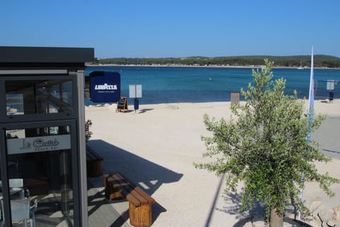 Beach nearby, sun loungers