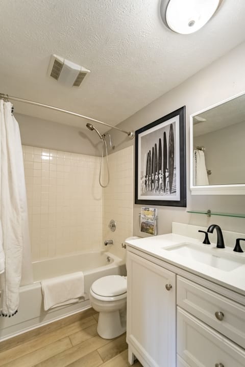 Combined shower/tub, hair dryer, towels, soap