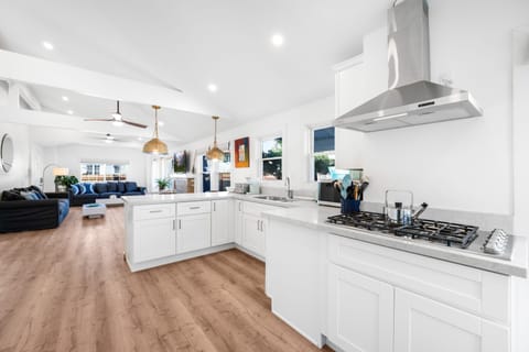 Dine in style with a kitchen that has modern appliances and beautiful finishes.