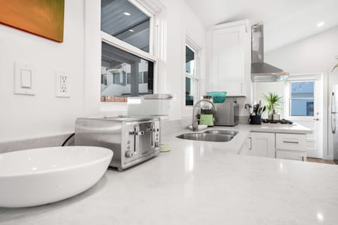 Kitchen stocked with essentials and Keurig with pods included!