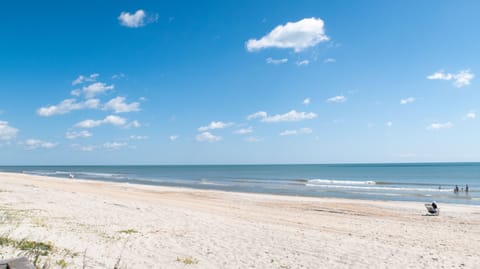 On the beach, sun loungers, beach towels