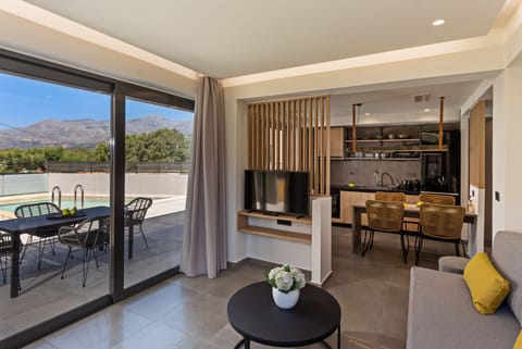 Featuring a flat screen TV.