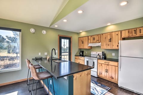A breakfast bar with your full-service kitchen so the cook can participate!