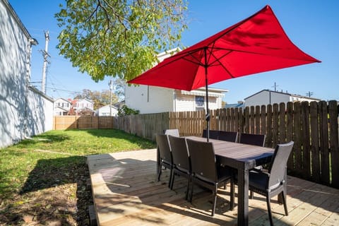 Enjoy a meal on the deck or play games in the massive backyard. There's plenty of room to get a game of Cornhole going.