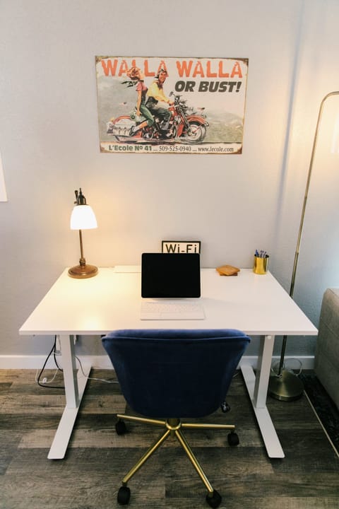 Work remotely from this comfortable sit/stand desk!
