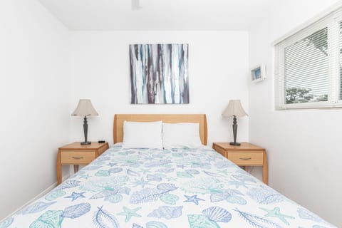 Bedroom #2 includes a queen bed and smart TV.