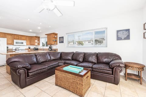 The open floor plan makes it easy for groups to unwind together after a day at the beach.