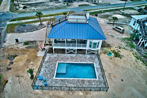 New  pool and paver area, on Gulf side of the home. 100 yards from beach.