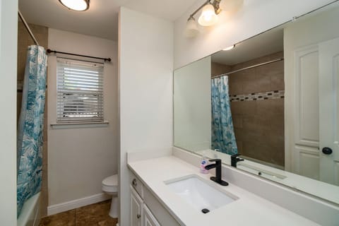 Combined shower/tub, hair dryer, towels, soap