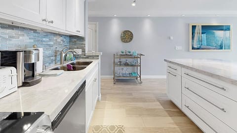 Modern, light and bright all-new kitchen with stainless steel appliances.