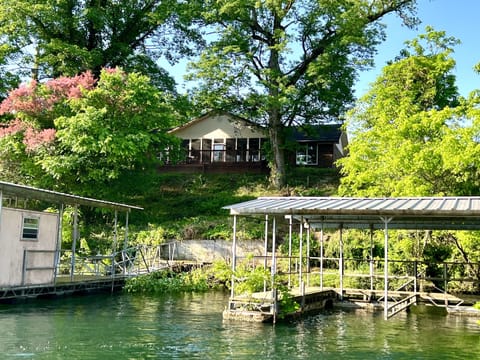 The dock with the house in the background