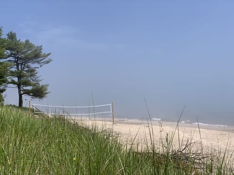 On the beach, sun loungers, beach towels